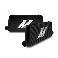 Mishimoto Universal Black R Line Intercooler Overall Size: 31x12x4 Core Size: 24x12x4 Inlet / Outlet - MMINT-URB